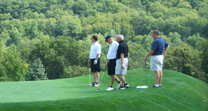 golfers on course