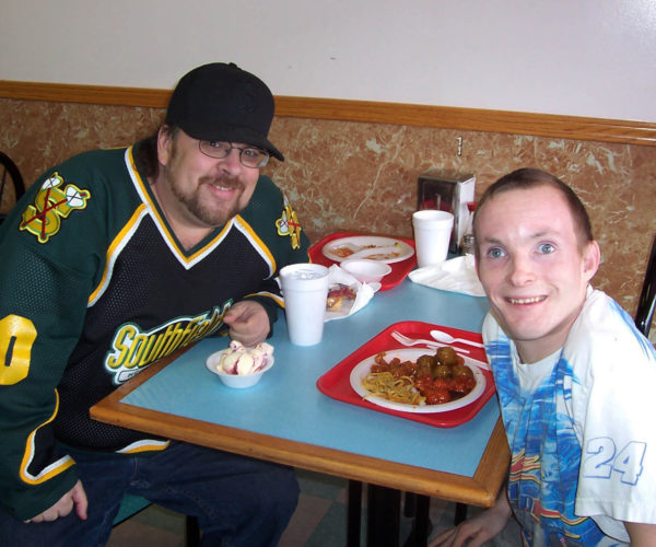 men eating lunch