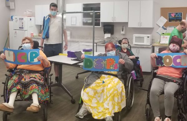 people holding UCP DSPs Rock signs