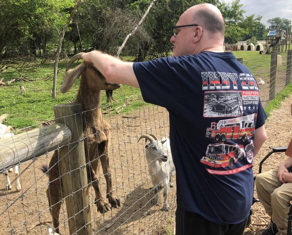 Participant pets goat