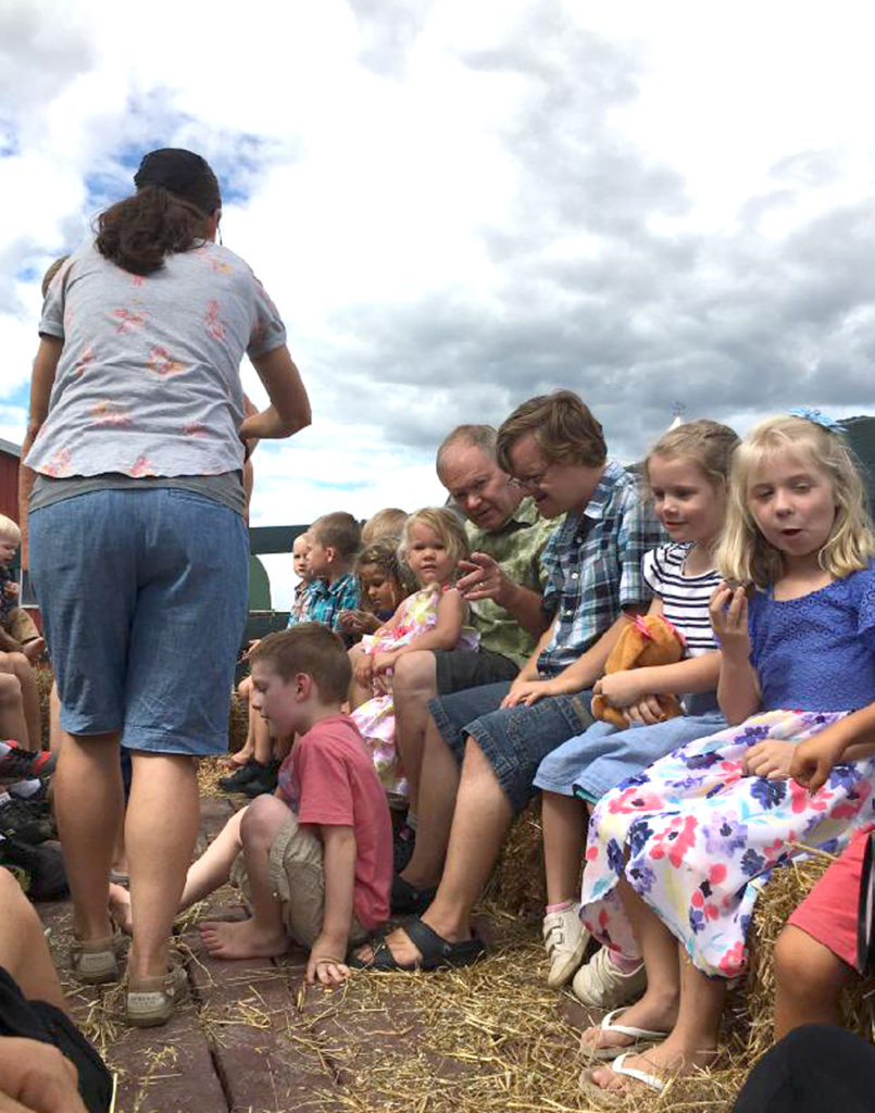 Josh on hayride with cousins