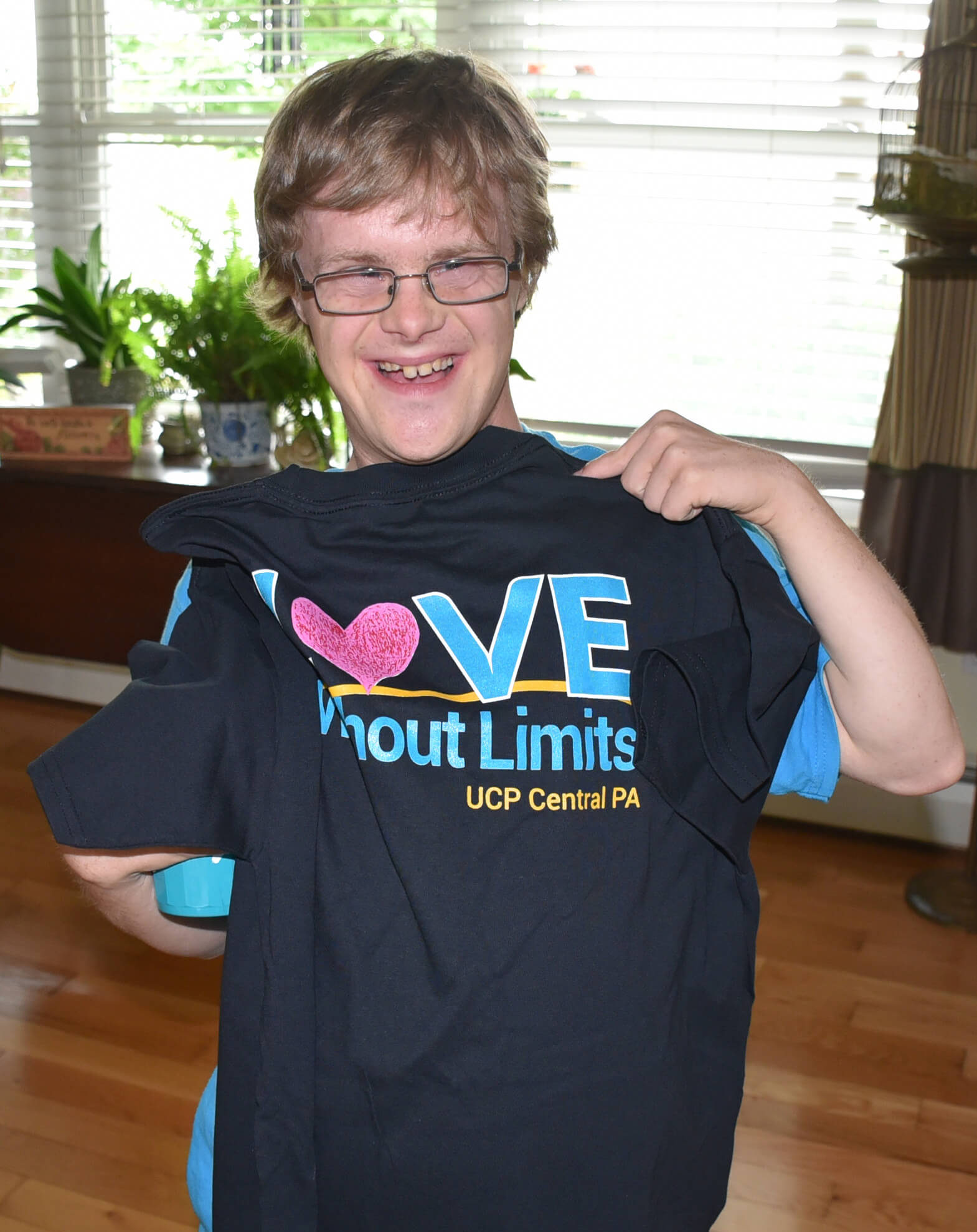Josh with LWOL tee_2_cropped Josh with UCP t-shirt