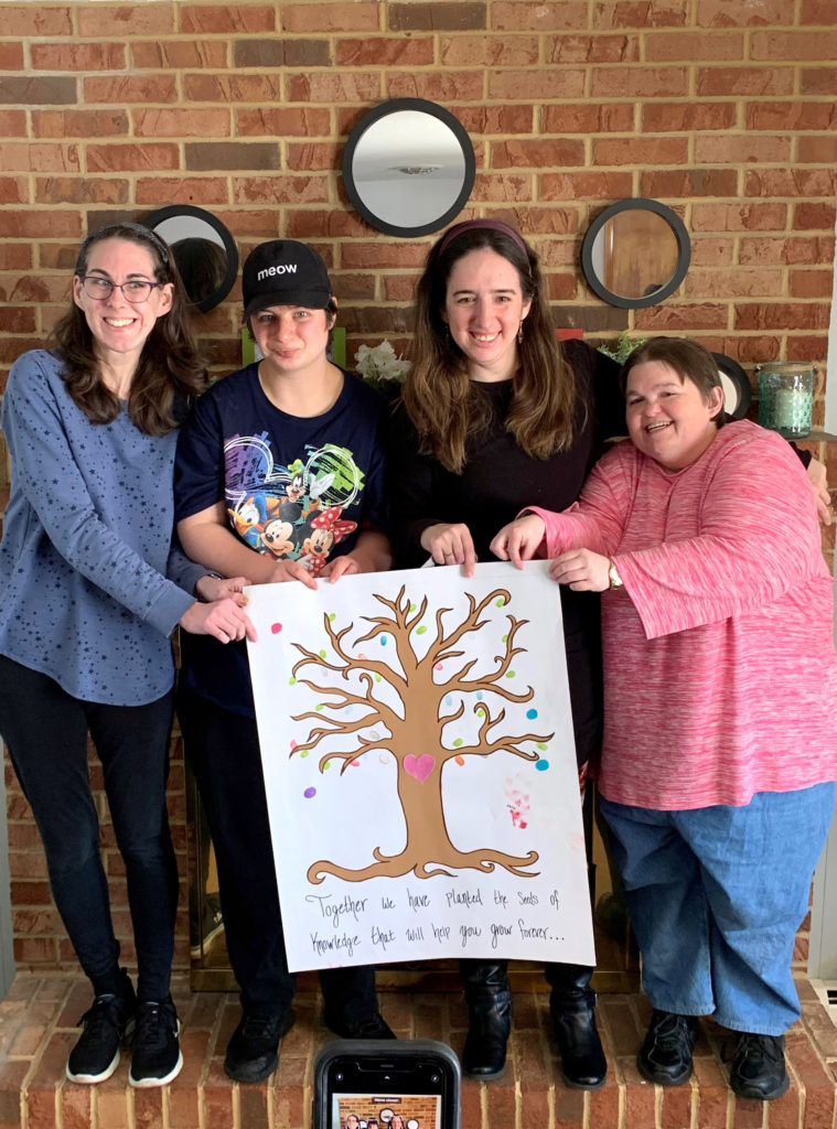 Graduates with tree picture